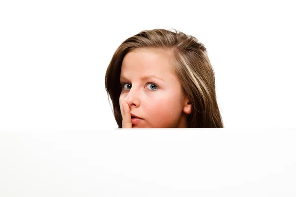 Young woman behind empty board — Stock Photo, Image