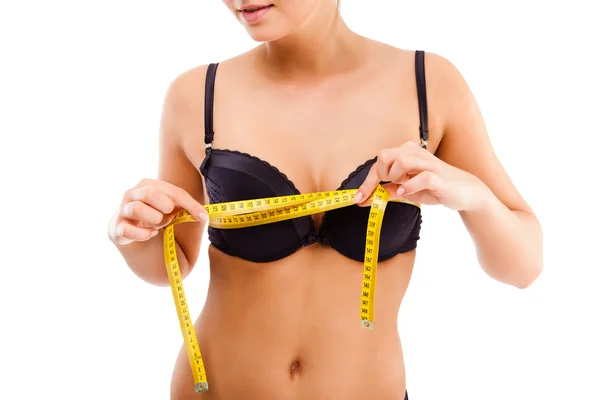 Woman measuring her slim body Stock Picture