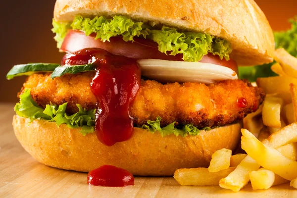 Big hamburger and French fries — Stock Photo, Image