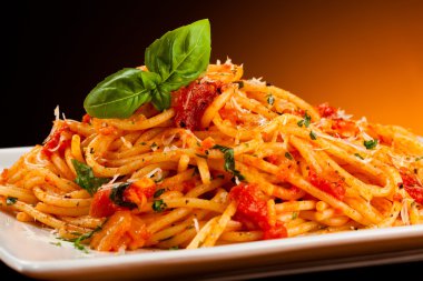 Pasta with tomato sauce and parmesan clipart