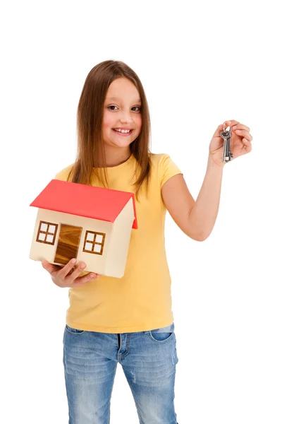 Meisje met model van huis — Stockfoto