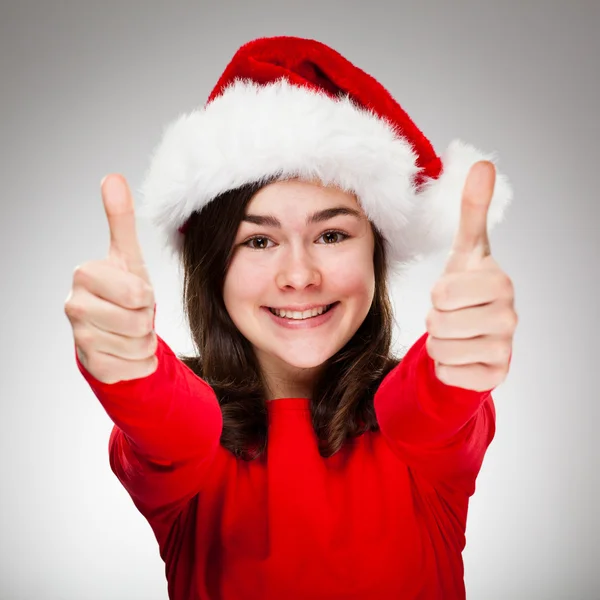 Mooi meisje in Kerstman hoed — Stockfoto