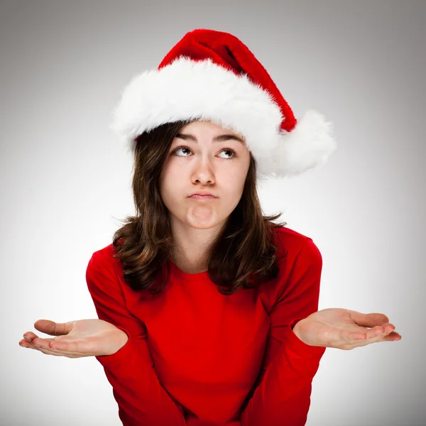 Menina bonita em chapéu de Papai Noel — Fotografia de Stock