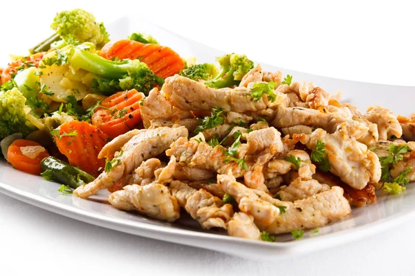 Roasted meat, white rice and vegetables Stock Picture