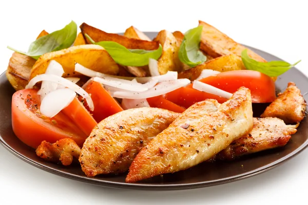 Grilled chicken breasts with vegetables Stock Photo