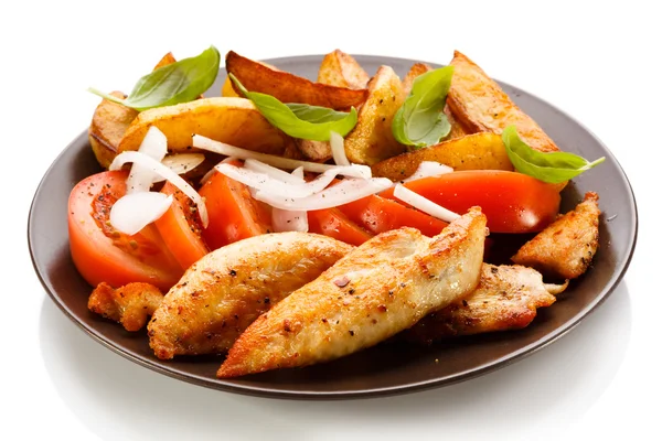 Grilled chicken breasts with vegetables Royalty Free Stock Photos