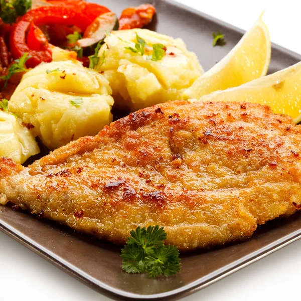 Pork chops, mashed potatoes and vegetable salad — Stock Photo, Image