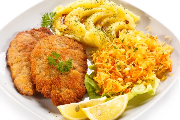 Pork chops, mashed potatoes and vegetable salad — Stock Photo, Image