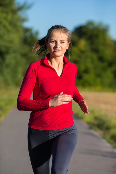 Donna che corre — Foto Stock