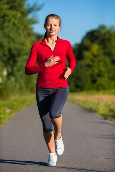 Woman running Royalty Free Stock Photos