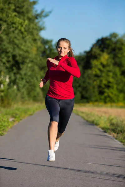 Donna che corre — Foto Stock