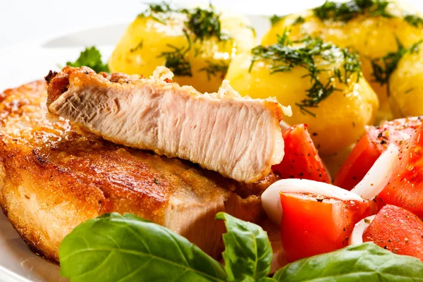 Pork chop, boiled potatoes — Stock Photo, Image