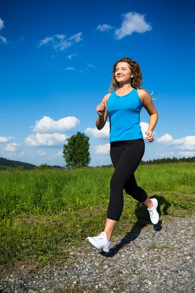 Donna che corre — Foto Stock