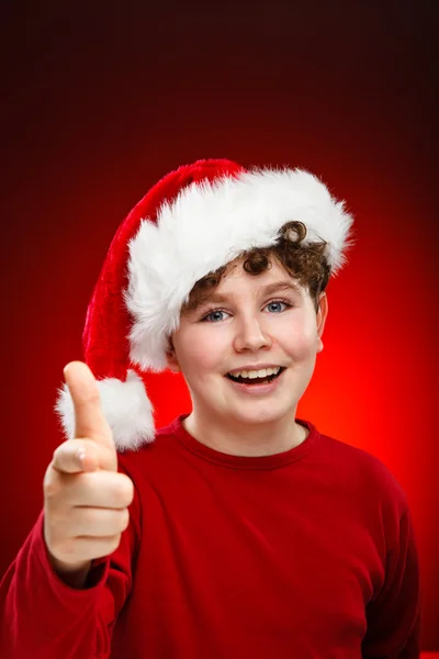 Pojke med jultomten hatt — Stockfoto