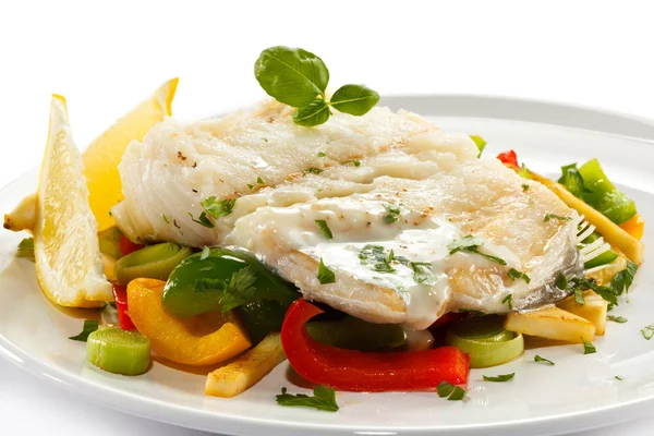 Boiled fish fillet with vegetables — Stock Photo, Image