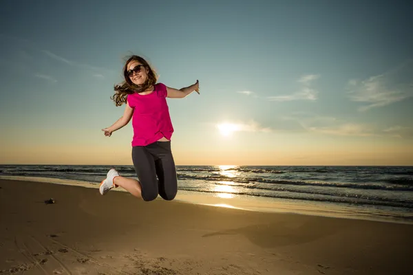 Teenager Girl Enjoying At The Beach 13880405 Stock Photo at Vecteezy