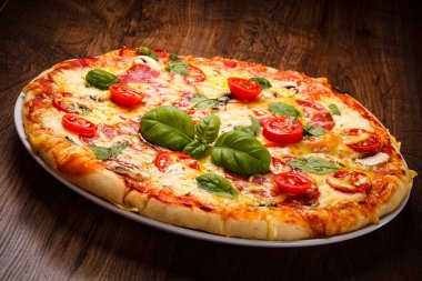 Pizza with tomatoes clipart