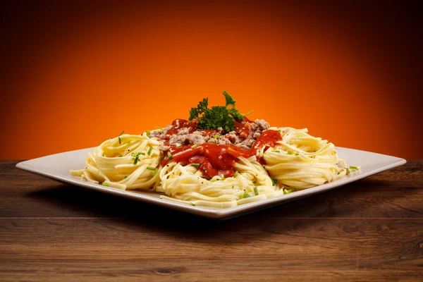 Pasta with meat, tomato sauce — Stock Photo, Image