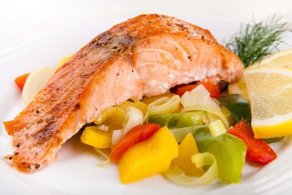Salmon with vegetables Royalty Free Stock Images