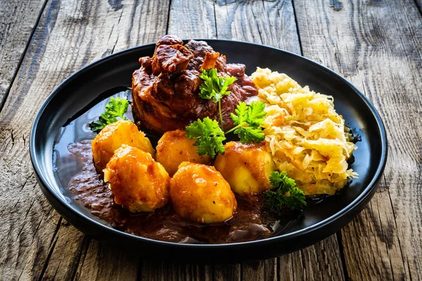 Roast Pork Knuckle Potatoes Fried Cabbage Wooden Table — Stock Photo, Image