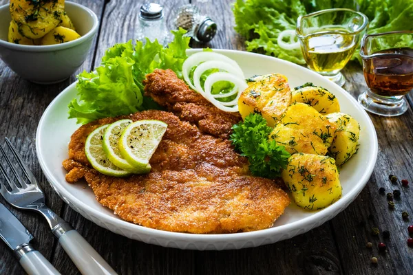 Breaded Fried Pork Chop Fried Potatoes Greens Wooden Table — Stock Photo, Image