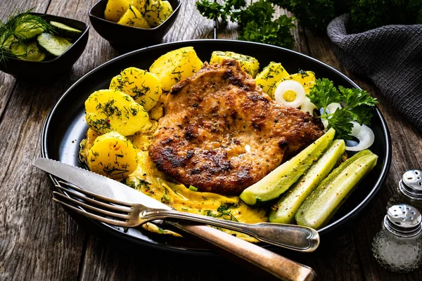 Fried Pork Chop Bone Egg Boiled Potatoes Cucumber Wooden Table — Stok fotoğraf