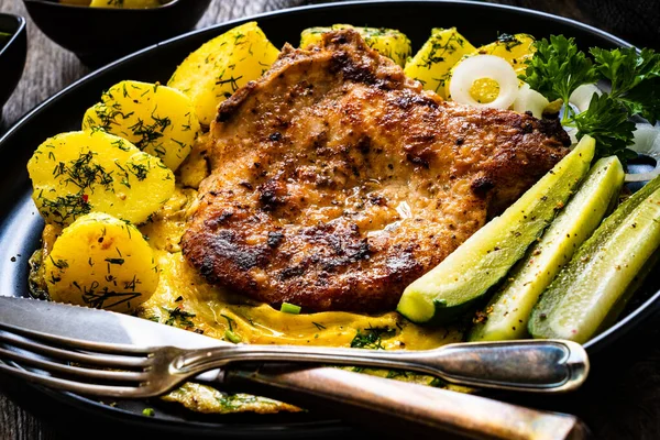 Fried Pork Chop Bone Egg Boiled Potatoes Cucumber Wooden Table — Stock fotografie