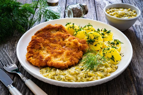 Breaded Fried Pork Chop Bone Boiled Potatoes Boiled Cabbage Wooden — Foto Stock