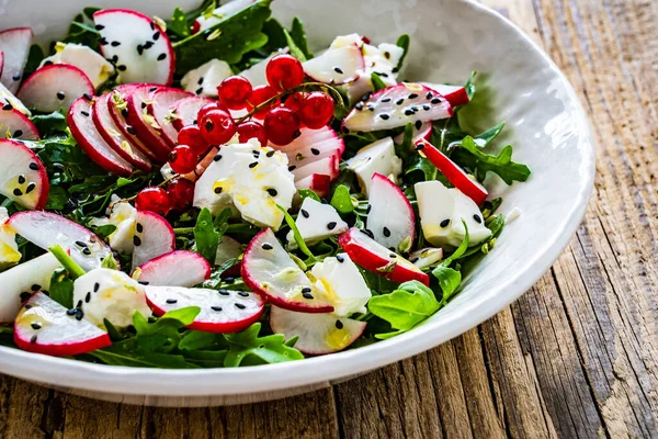 Fresh Salad Feta Cheese Radish Leafy Greens Wooden Table — Zdjęcie stockowe