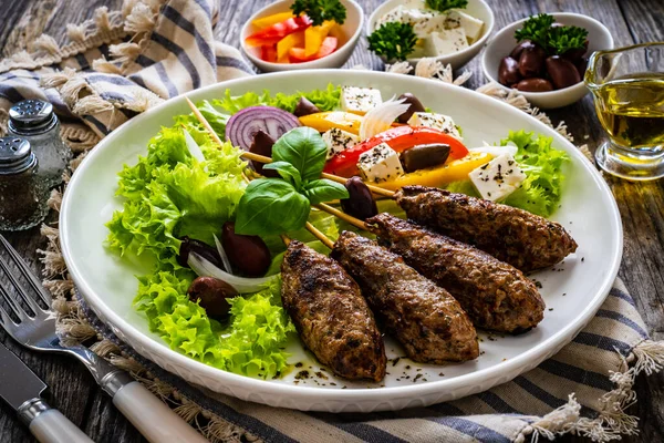 Souvlaki Greek Shashlik Served Fresh Green Vegetables Feta Cheese Wooden — Foto Stock