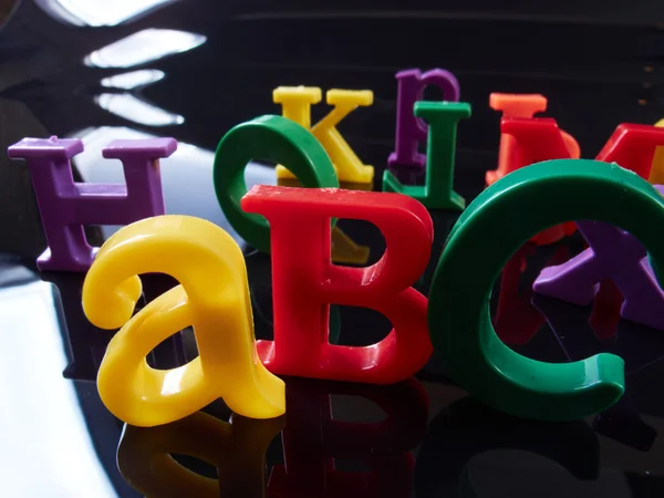 Plastic alphabet letters — Stock Photo, Image