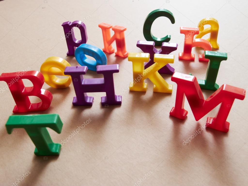 Colore plastic alphabet letters Stock Photo by ©strelok 23155490