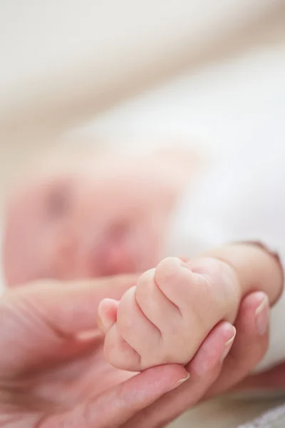 Baby's hand — Stockfoto