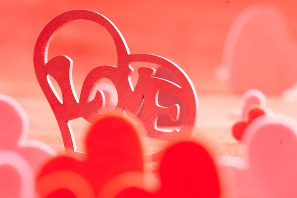 Hearts on red background — Stock Photo, Image
