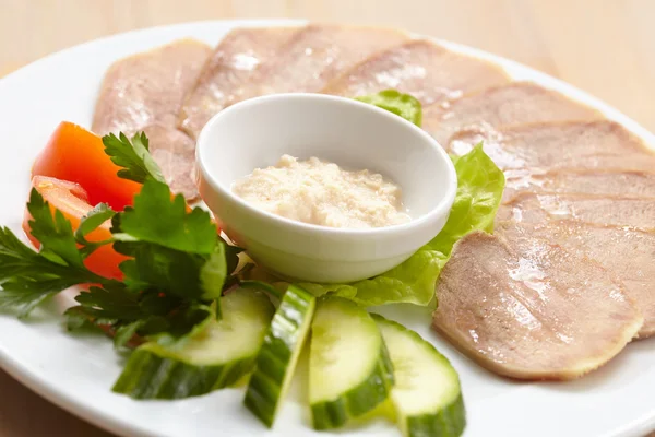 Slices of boiled beef tongue — Stock Photo, Image