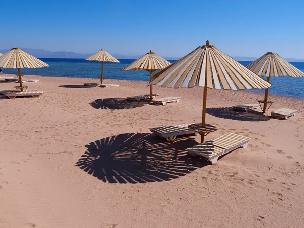 Umbrella on beach — Stock Photo, Image