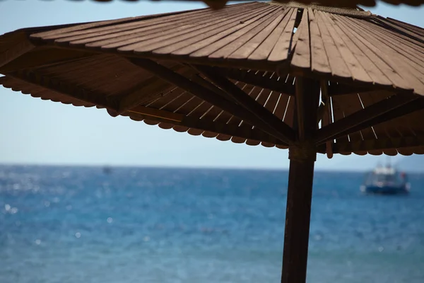 Umbrella on beach — Stock Photo, Image