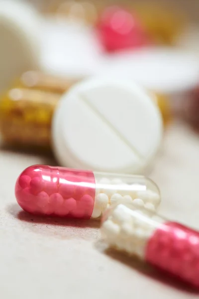 Red and white pills — Stock Photo, Image