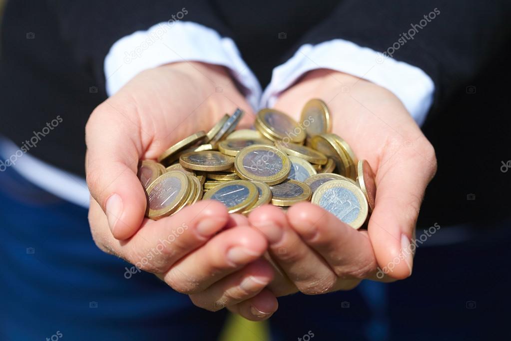Coins in the female hands