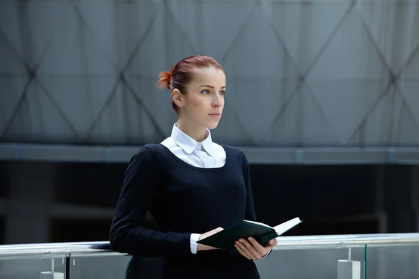 Woman with notebook — Stock Photo, Image