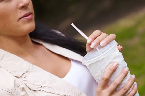 Woman with drink — Stock Photo, Image