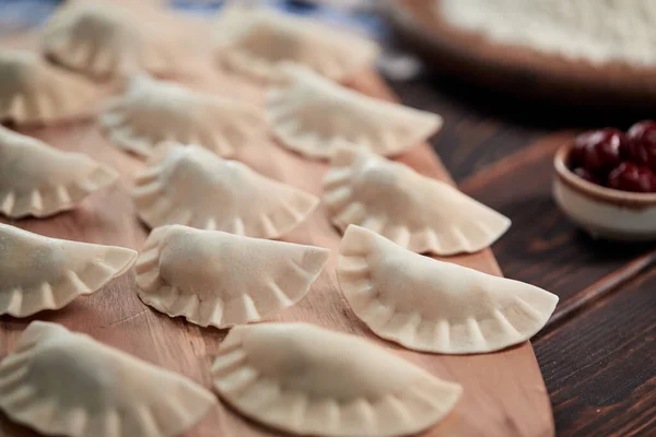 Raw Dumplings Cherries Wooden Board — Fotografia de Stock