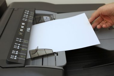 Making copies on the laser copier machine clipart