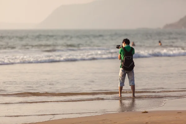 Il fotografo sulla costa — Foto Stock