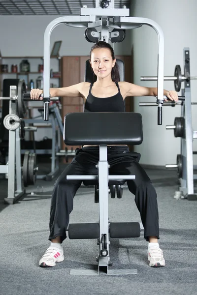 Training in the gym — Stock Photo, Image