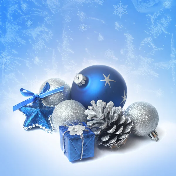 Blue christmas balls on the snow — Stock Photo, Image