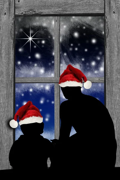 Vater und Sohn schauen nach dem Weihnachtsmann — Stockfoto