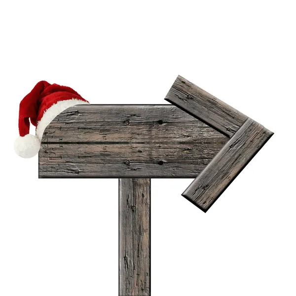 Noel Baba şapkası karlı zemin üzerine ahşap işaretiyle — Stok fotoğraf