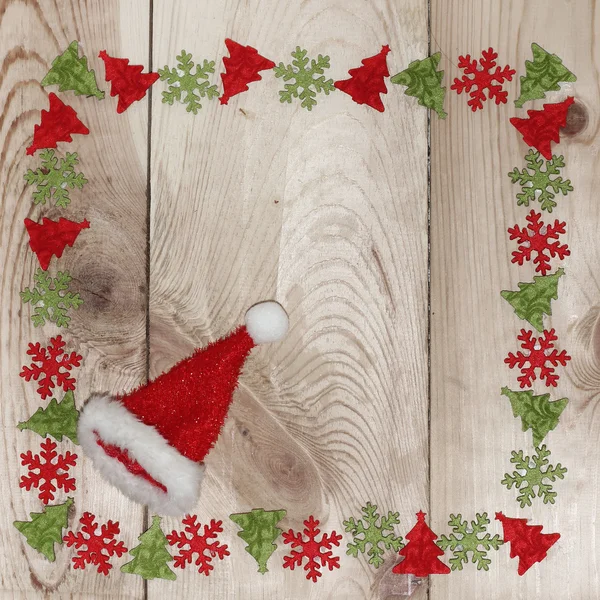Trä bakgrund med jul dekorationer — Stockfoto