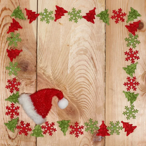 Drewniane tło z dekoracjami świątecznymi — Zdjęcie stockowe